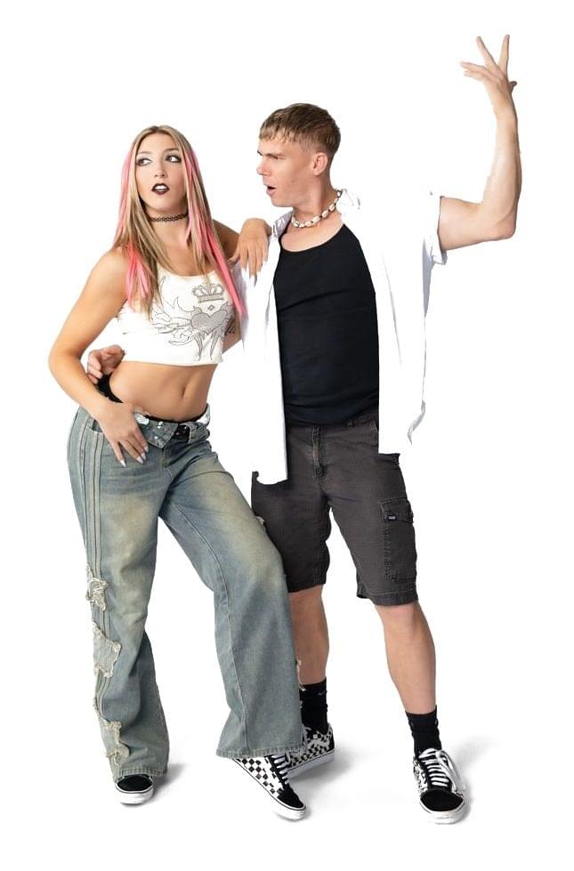 Two Punk Rock Brunch performers striking a dramatic 90s pose